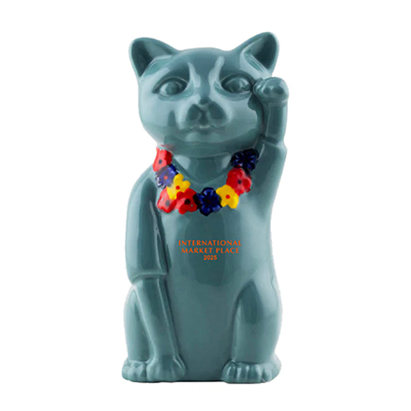 Blue cat figurine with a colorful necklace on a white background